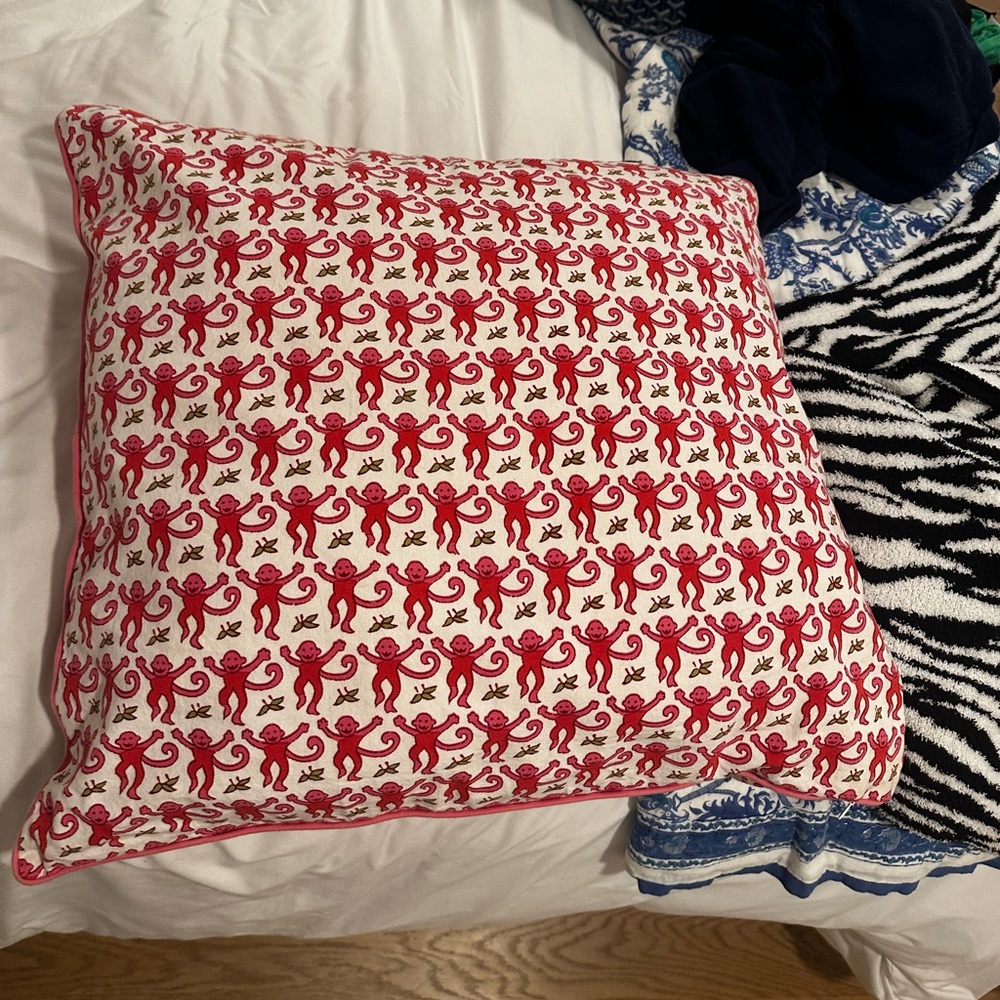 Red and White Patterned Pillow